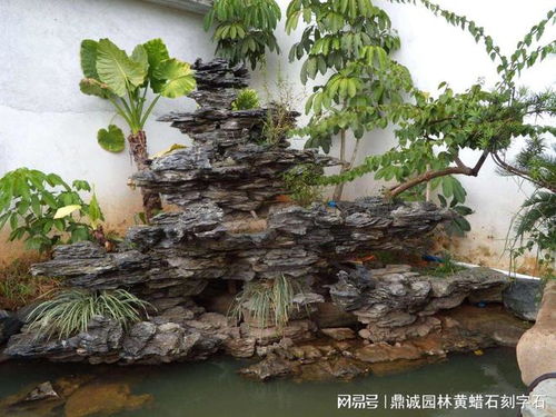 英石叠石假山流水水池案例,千层石流水假山效果设计